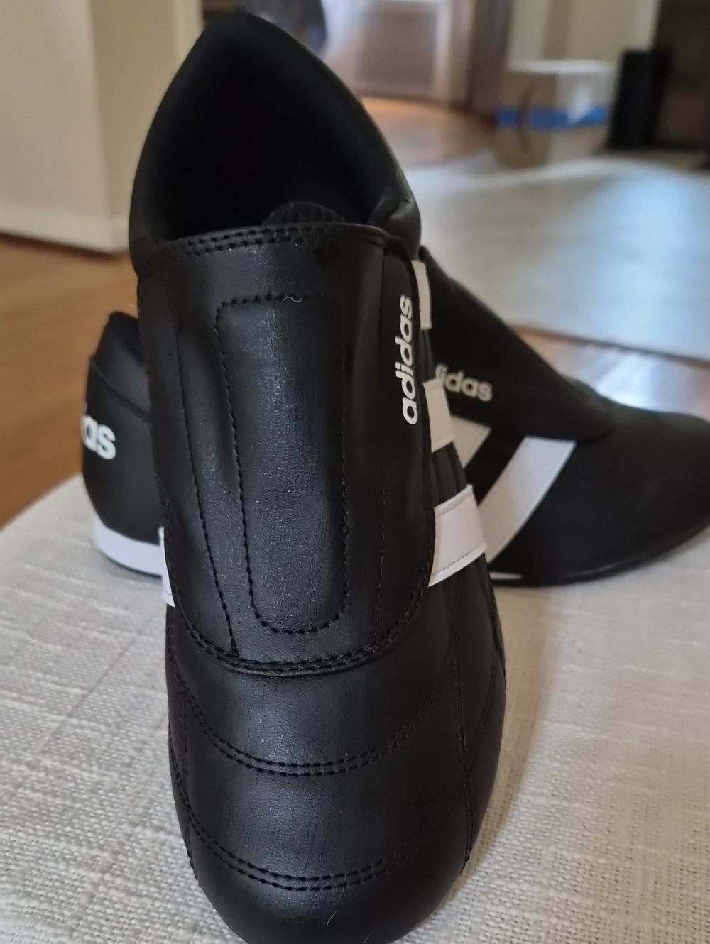 adidas Women's Size 8 Black and White Slip-On Sneakers